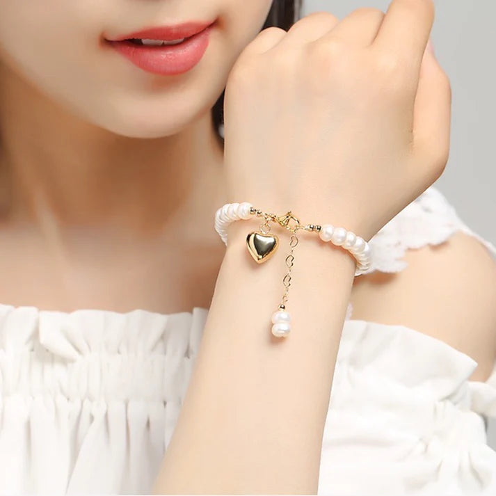 Süßwasserperlen-Armband mit Gold Herz-Charm